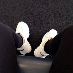 White Fila Shoes.